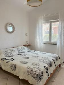 Posteľ alebo postele v izbe v ubytovaní Apartment Samanta
