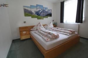 Postel nebo postele na pokoji v ubytování Landhaus Müller