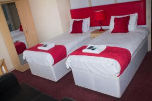 Postel nebo postele na pokoji v ubytování Hotel Express Newcastle Gateshead