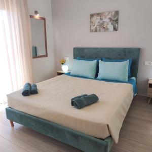 Posteľ alebo postele v izbe v ubytovaní Depie Luxury Apartment in Pastida Rhodes