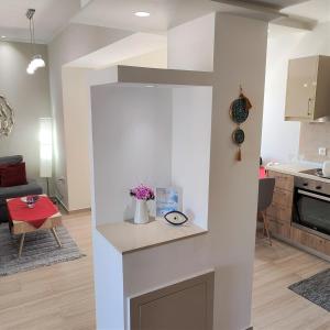 Kuchyňa alebo kuchynka v ubytovaní Depie Luxury Apartment in Pastida Rhodes
