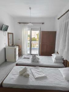Gambar di galeri bagi Plexidas Rooms di Paralía Skotínis