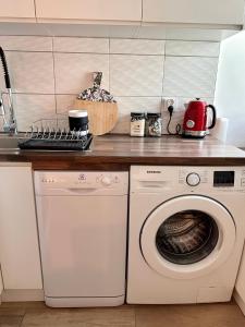 Kuchyňa alebo kuchynka v ubytovaní Apartament Centrum Chmielna 73c