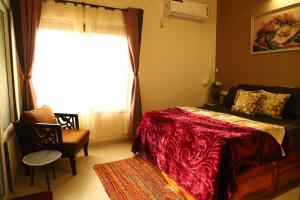Giường trong phòng chung tại Sixth Element -3BHK Villa with indoor private pool