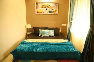 Giường trong phòng chung tại Sixth Element -3BHK Villa with indoor private pool +33 ảnh