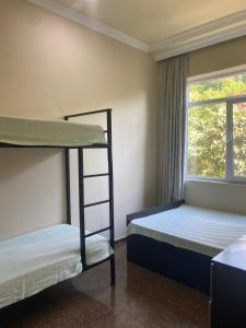 Postel nebo postele na pokoji v ubytování Maguli Home Gonio