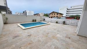 a swimming pool on the roof of a building at Seb apartment mamaia nord in Năvodari
