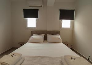 Ένα ή περισσότερα κρεβάτια σε δωμάτιο στο K78 Studios A2