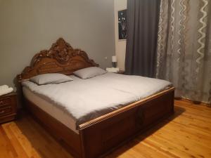 Ein Bett oder Betten in einem Zimmer der Unterkunft Wine House KNIAZ