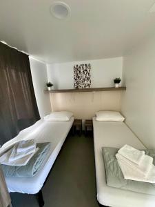 Postel nebo postele na pokoji v ubytování Mobilna kućica CISSA