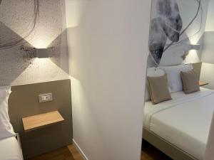 Letto o letti in una camera di Robely rooms