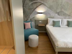 Voodi või voodid majutusasutuse Robely rooms toas