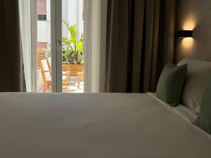 Letto o letti in una camera di Robely rooms