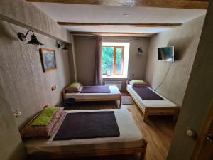 Postel nebo postele na pokoji v ubytování PATMALAS
