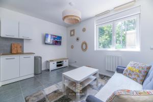 Η κουζίνα ή μικρή κουζίνα στο Le Saint Ferjus 2 Chambres-Parking Gratuit +6 φωτογραφίες