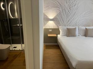Letto o letti in una camera di Robely rooms