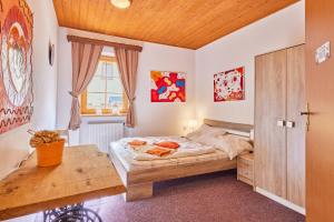 Postel nebo postele na pokoji v ubytování Horská chata 049 Prkenný Důl, Žacléř, Krkonoše