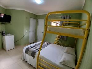 Postel nebo postele na pokoji v ubytování Pousada Monte das Candeias