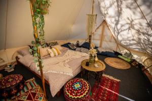 Ein Bett oder Betten in einem Zimmer der Unterkunft Glamping Hive
