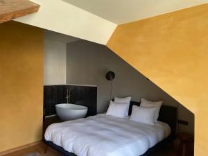Postel nebo postele na pokoji v ubytování Boutique Hotel Marie Marie