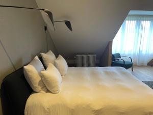 Postel nebo postele na pokoji v ubytování Boutique Hotel Marie Marie