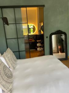 Postel nebo postele na pokoji v ubytování Boutique Hotel Marie Marie