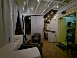 a living room with a couch and chairs in a room at Patrizia Casa Vacanze in Sant'Agnello