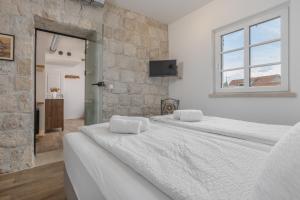 Casa Columba - 4 Star Design Boutique Hotel with Outdoor Pool & Private Garden客房内的一张或多张床位
