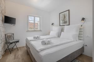Casa Columba - 4 Star Design Boutique Hotel with Outdoor Pool & Private Garden客房内的一张或多张床位