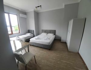 Letto o letti in una camera di Elite Hotel Kobuleti