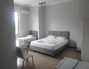 Letto o letti in una camera di Elite Hotel Kobuleti