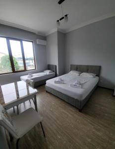 Letto o letti in una camera di Elite Hotel Kobuleti