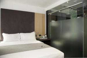 Cama o camas de una habitación en The Z Hotel City