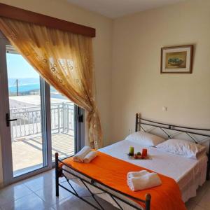 A bed or beds in a room at Bellavista House in Monolithos Rhodes