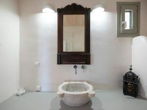 Kúpeľňa v ubytovaní Donum Dei Seaside Suites & Villa