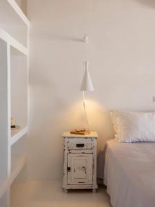 Posteľ alebo postele v izbe v ubytovaní Donum Dei Seaside Suites & Villa