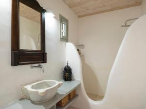 Kúpeľňa v ubytovaní Donum Dei Seaside Suites & Villa