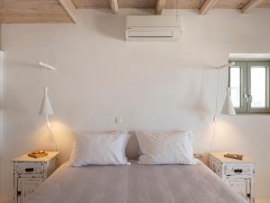 Posteľ alebo postele v izbe v ubytovaní Donum Dei Seaside Suites & Villa