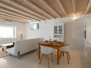 Posedenie v ubytovaní Donum Dei Seaside Suites & Villa