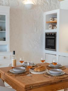 Kuchyňa alebo kuchynka v ubytovaní Donum Dei Seaside Suites & Villa