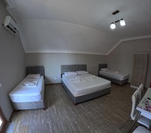 Letto o letti in una camera di Elite Hotel Kobuleti