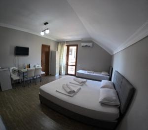 Letto o letti in una camera di Elite Hotel Kobuleti