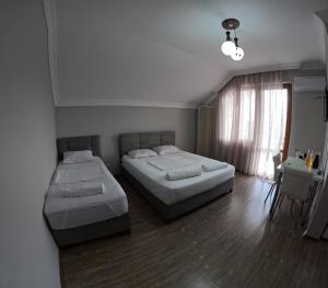 Letto o letti in una camera di Elite Hotel Kobuleti