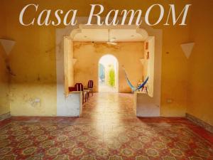 a hallway in an old building with a sign that reads casa roma at Casa Ramon Merida 2 BR AC Private Pool Centro in Mérida