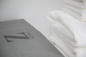 Certificado, premio, señal o documento que está expuesto en The Z Hotel City