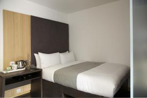 Cama o camas de una habitación en The Z Hotel City
