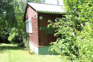 a wooden play house with the words play math lick at Páfrány - Lak in Mátraszentimre +4 photos