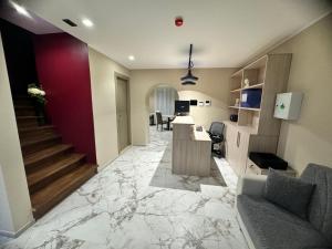 a living room with a marble floor at Pasitea B&B in Serra San Bruno
