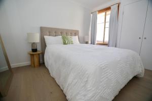 Una cama o camas en una habitación de Jamberoo 13 fotos más