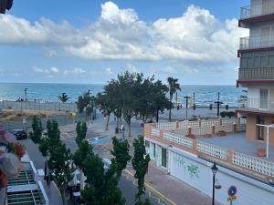 a view of the ocean from a balcony of a building at La caleta in Oropesa del Mar